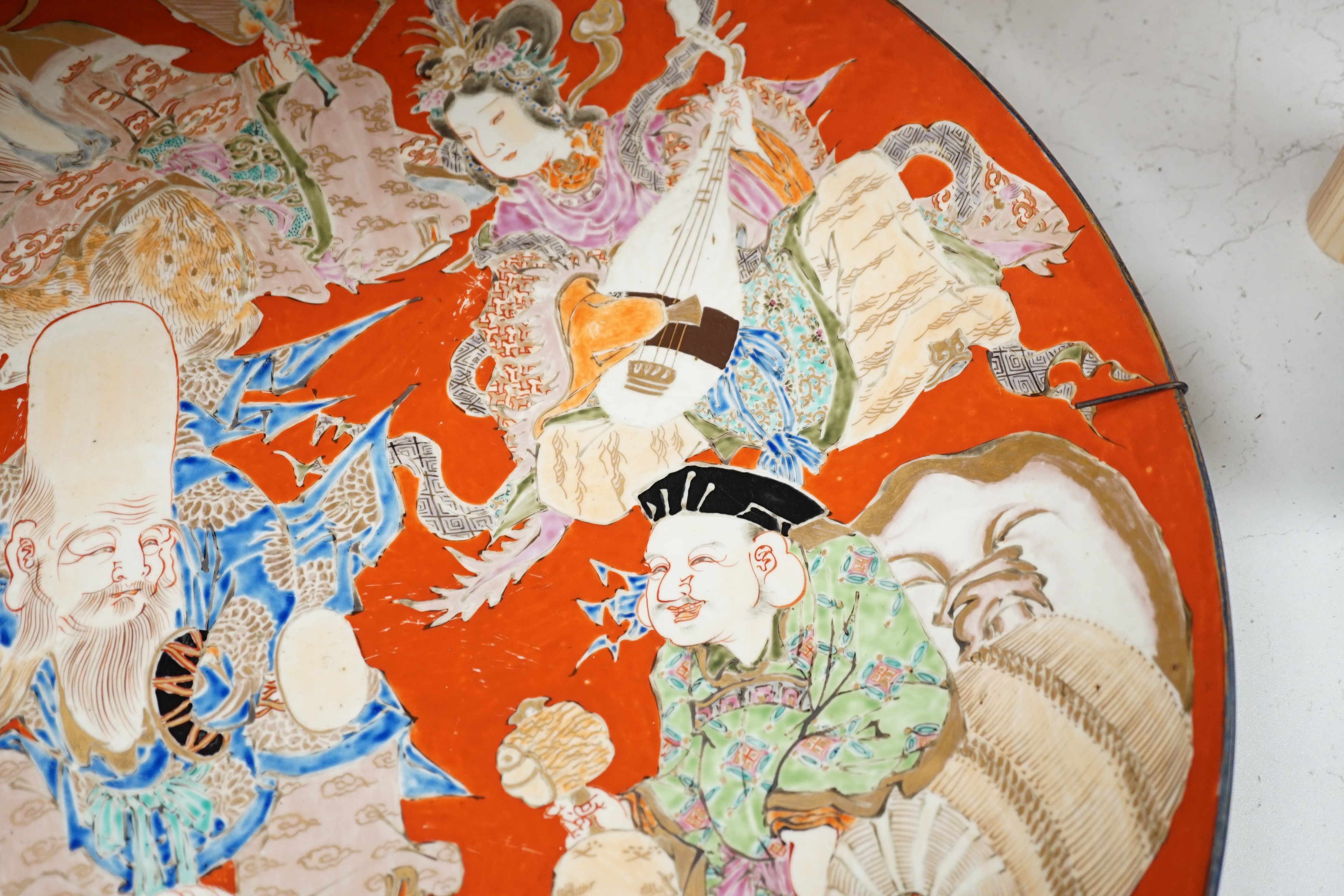 A massive Japanese Arita 'Seven Gods of Happiness' dish, Meiji period, 60.5cm.